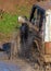 SUV wheel stalled in mud and water