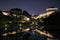 Suwon, South Korea - April 29, 2018 : Night view of the Hwaseong Fortress and its reflection on the Yongyeun pond