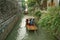 SUZHOU,CHINA-MAY 19, 2019-Traditional rowing boat taking tourists along the canal on Pingjianglu, Suzhou, China.Pingjiang road was