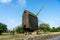 Svaneke, Bornholm / Denmark - July 29 2019: Old Wind Mill in the outskirts of Svaneke in Bornholm