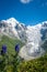 Svaneti landscape with glacier and snow-capped mountain in Georgia.