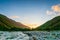 Svaneti landscape at sunset and river on the trekking and hiking route near Mestia village in Svaneti region, Georgia