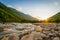 Svaneti landscape at sunset and river on the trekking and hiking route near Mestia village in Svaneti region, Georgia