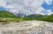 Svaneti wild mountains landscape. Wild mountain river in Georgia. Summer nature in Caucasus mountains. Scenic mountains on sunny