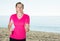 Svelte woman jogging on beach