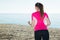 Svelte woman jogging on beach