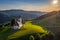 Sveti Andrej, Slovenia - Aerial drone view of Saint Andrew church Sv. Andrej at sunset in Skofja Loka area