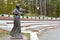 SVETLOGORSK, RUSSIA. Sculpture `Girl with Violin` on the background of the amphitheater. Muse creative park. Kaliningrad region