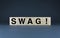 Swag. Cubes form the word Swag