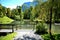 Swan on a beautiful lake in Germany amid mountains and a blue sky