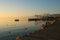 Swan floating along the shoreline of Lake Garda.