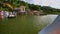 Swan Pedal Boats Move to Pier on Forestry Bank at Back Sunlight