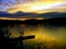 SWAN SUNSET OVER LAKE