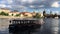 Swans and cruise ship in Vltava river