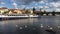 Swans and cruise ship in Vltava river