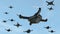 Swarm of security drones with surveillance camera flying in the sky