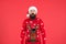 Sweater with deer. Hipster bearded man wear winter sweater and hat red background. Check out my sweater. Happy new year