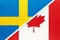 Sweden and Canada, symbol of national flags from textile. Championship between two countries