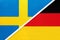 Sweden and Germany, symbol of national flags from textile. Championship between two European countries