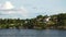 Sweden. Idyllic Stockholm archipelago style. Amazing Swedish Wooden Log Cabin House On Rocky Island. Traditional red