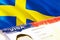 Sweden immigration document close up. Passport visa on Sweden flag. Sweden visitor visa in passport,3D rendering. Sweden multi