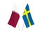 Sweden and Qatar flags