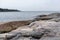 Sweden rocky sea side. Northern epic mystic cloudy grey landscape