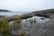 Sweden rocky sea side. Northern epic mystic cloudy grey landscape