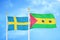 Sweden and Sao Tome and Principe two flags on flagpoles and blue sky