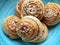 Swedish cinnamon buns and cardamom buns, made from yeast dough.