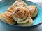 Swedish cinnamon buns and cardamom buns, made from yeast dough.