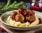 Swedish meatballs with mashed potatoes and red lingonberry sauce. Wooden table. Swedish cuisine