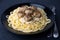 Swedish noisettes (fricandel) with spaghetti and Brune Sos creamy sauce.