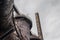 Sweeping curves of rusted pipes, towers, and smokestacks against a gray cloudy sky