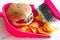 Sweeping junk food with chips burger and dustpan concept of health detox diet