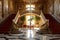 sweeping marble staircase in elegant ballroom