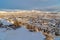 Sweeping view of homes in a picturesque neighborhood amidst scenic winter views