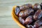 Sweet algerian arabic dates fruits on a plate