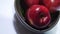 Sweet apple with stem leaf on bowl. Image fruit