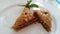 Sweet baklava on plate isolated