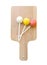 Sweet ball stick on wooden plate isolate, clipping path