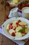 Sweet berry breakfast. Sweet lazy pierogi, dumplings with sour cream, butter and strawberry on wooden background. Italian gnocchi.