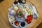 Sweet bingsu korean desert with fruits, melon, strawberries, blueberries, watermelon, icecream