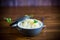 Sweet boiled vermicelli with milk in a ceramic bowl