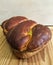 Sweet bread traditional Romanian bakery on wooden background