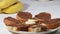 Sweet breakfast, preparing banana sandwiches with chocolate paste and banana, easy recipe concept