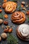 Sweet bun rolls with a filling of cherry jam. Kanelbulle Swedish dessert. Festive decoration with dried fruits, nuts and a