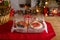 Sweet canapes on a table with a Christmas background.