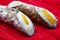 Sweet Cannolo Siciliano. Traditional south Italian dessert. Delicious Sicilian Cannolo filled with ricotta cheese