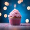 Sweet celebration Cupcake with pink cream and burning candle